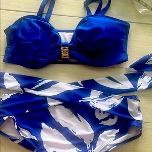 Woman’s 2 pc swimsuit size 3xl. 38dd